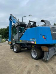 Грейферный погрузчик