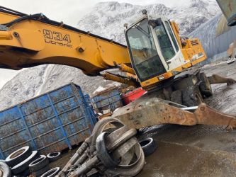 Liebherr A934 с ножницами LaBounty